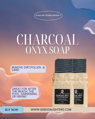 "Charcoal Onyx Soap by Sebi's Daughters, a detoxifying blend with activated charcoal to deeply cleanse and purify your skin for a refreshed, smooth feel. Set against a gradient sky background with fluid abstract shapes, reflecting the essence of the Spring Collection. Includes a 'Buy Now' button and website URL."
