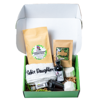 Outcold Virus Box by Sebi's Daughters, featuring seamoss elderberry capsules, eucalyptus shower balms, Honduran tea, 2oz elderberry plus, eucalyptus chest rub, seamoss lip balm, and a Sebi’s Daughters washcloth.