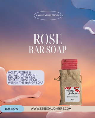 "Pretty Woman Rose Infused Soap Bar by Sebi's Daughters, a luxurious soap enriched with rose petals and infused with natural ingredients to nourish and pamper your skin. Set against a gradient sky background with fluid abstract shapes, reflecting the essence of the Spring Collection. Includes a 'Buy Now' button and website URL."