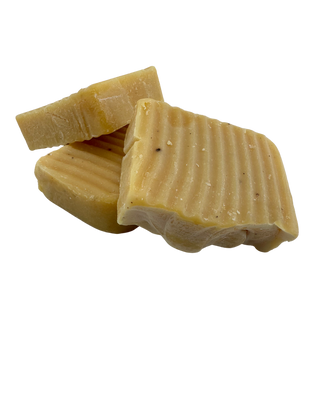 Transparent Image of of Three (3) Seamoss Papaya Melon Soap Bar's from Sebi's Daughters highlighting their Light Golden Yellow Hue.  These soaps are handmade by Kellie Bowman, Doctor Sebi's very own daughter right at Sebi's Daughters Alkaline Living and Alkaline Lifestyle Office In Atlanta, GA.