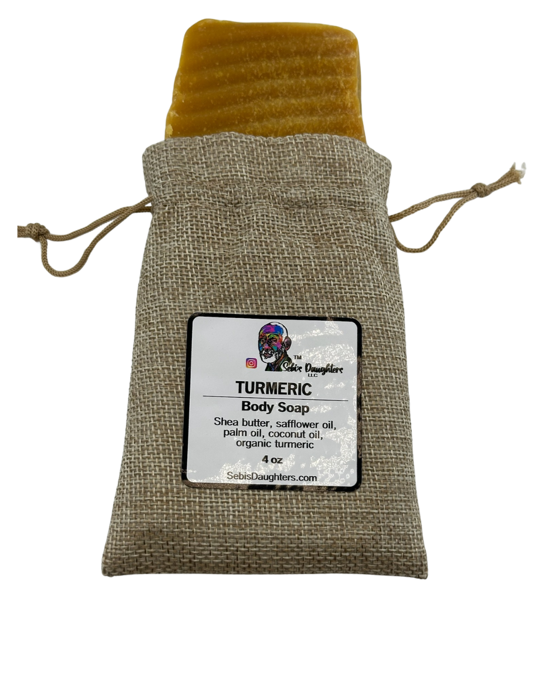 Sebi’s Daughters Organic Turmeric Soap bar on a white background, showcasing its natural golden color and smooth texture, made with shea butter, coconut oil, and organic turmeric for an alkaline lifestyle.