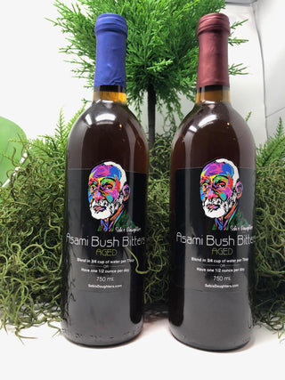 2 Bottles of Bush Bitters in a 750 ML Bottle.  One with a Blue Seal, and One With A Maroon.