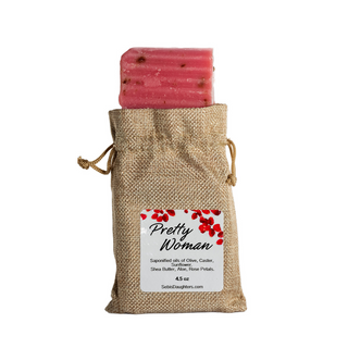 Image of Sebi's Daughters Pretty Woman Rose Soap in a burlap sack that closes on the sides with drawstrings on each side.